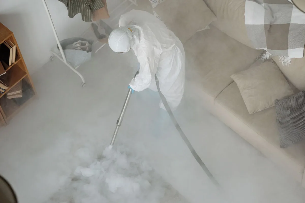 Biohazard cleanup technician in protective equipment, William Paterson University of New Jersey, NJ